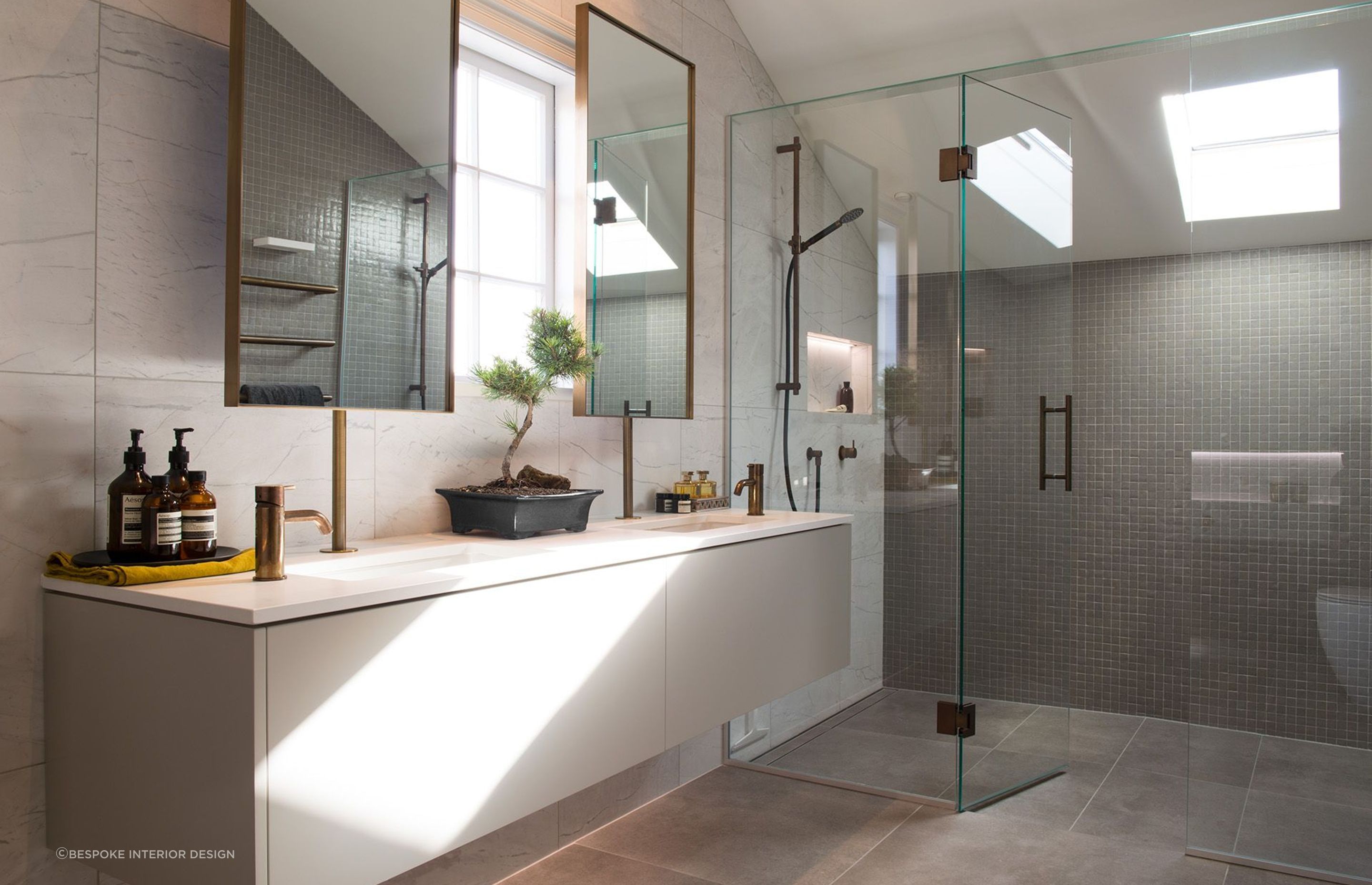 It's hard to beat the look and feel of a high-quality bathroom renovation as seen here at Rangitoto House in Remuera