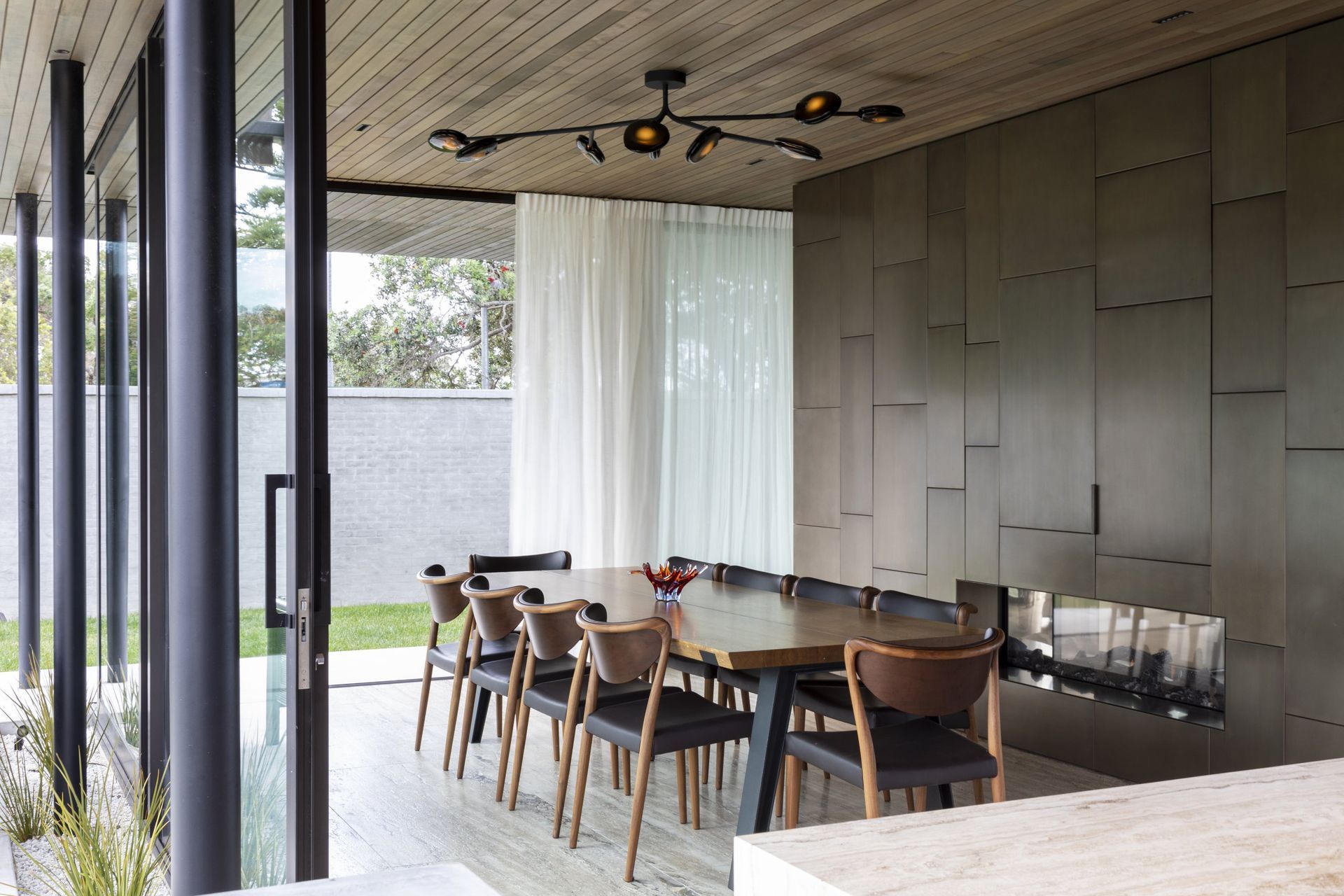 Finding a dining table that matches your dining chairs, decor and the size of your space is fundamental to success, seen here with the stylish Side-to-side Table by QLiv.