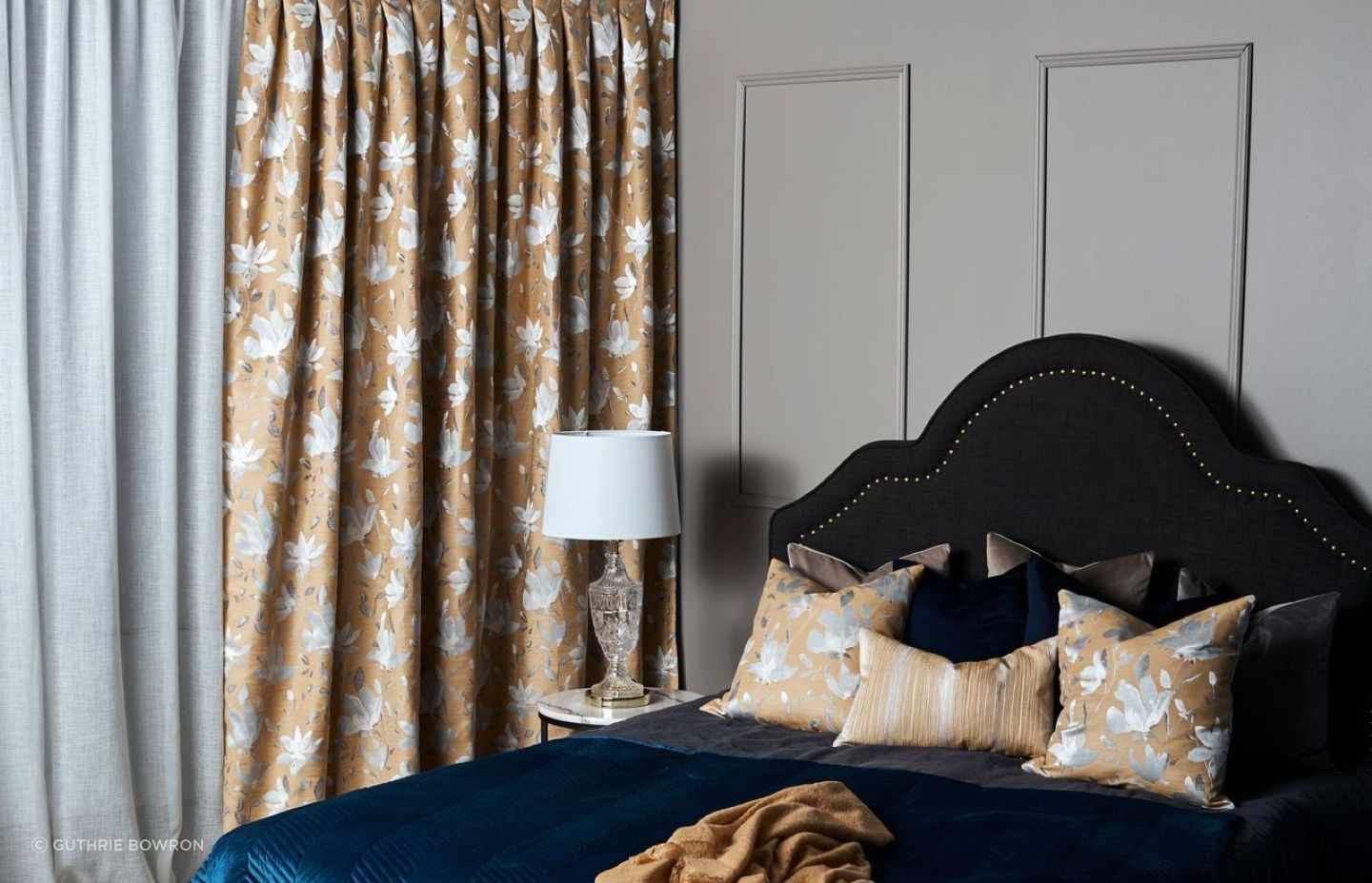 High-quality drapery, like this Santa Cruz by Maurice Kain Drapery, will help keep noise outside the home.