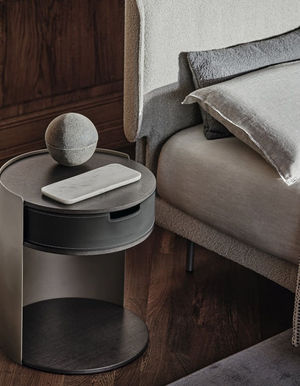 Metal bedside tables, like this Skin Side Table, offer a blend of style and functionality.