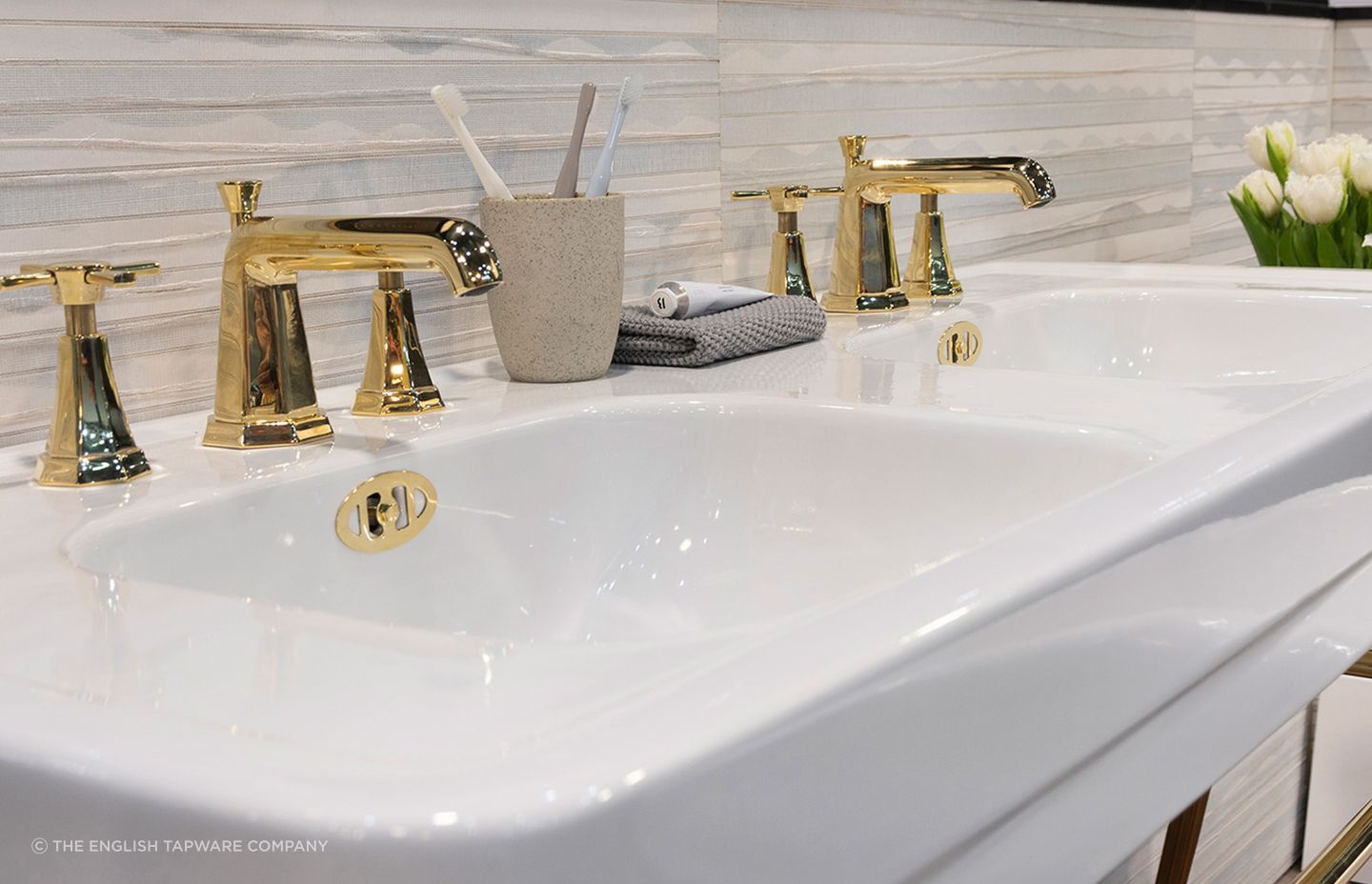A console sink like the Soho 1300 Double Basin
by The English Tapware Company, brings vintage flair to a space.