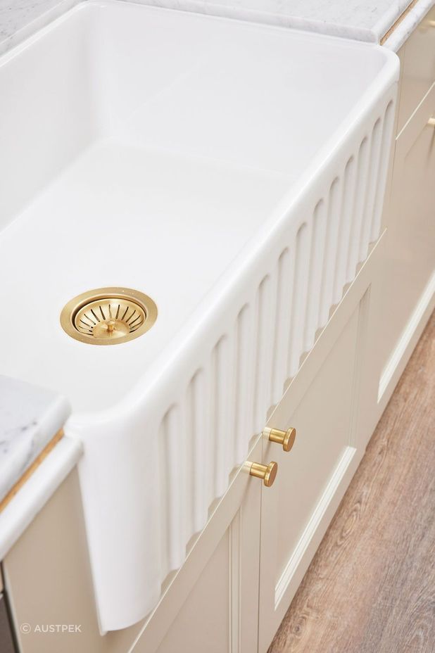 The Turner Hastings Novi Ribbed Farmhouse Butler Sink in Gloss White is stylishly distinctive and practical.