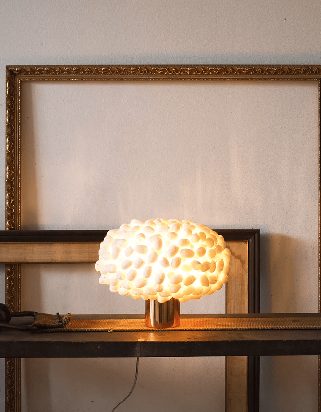 The delicately beautiful individual silk cocoons of the Unit Table C Table Lamp by Ango is a wonderful unique feature.