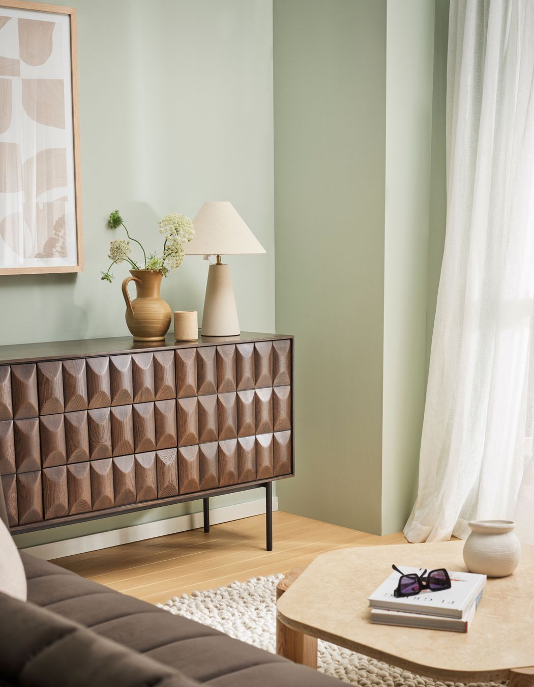 Create depth in your living room by enhancing your panelling with a stronger hue to your walls.