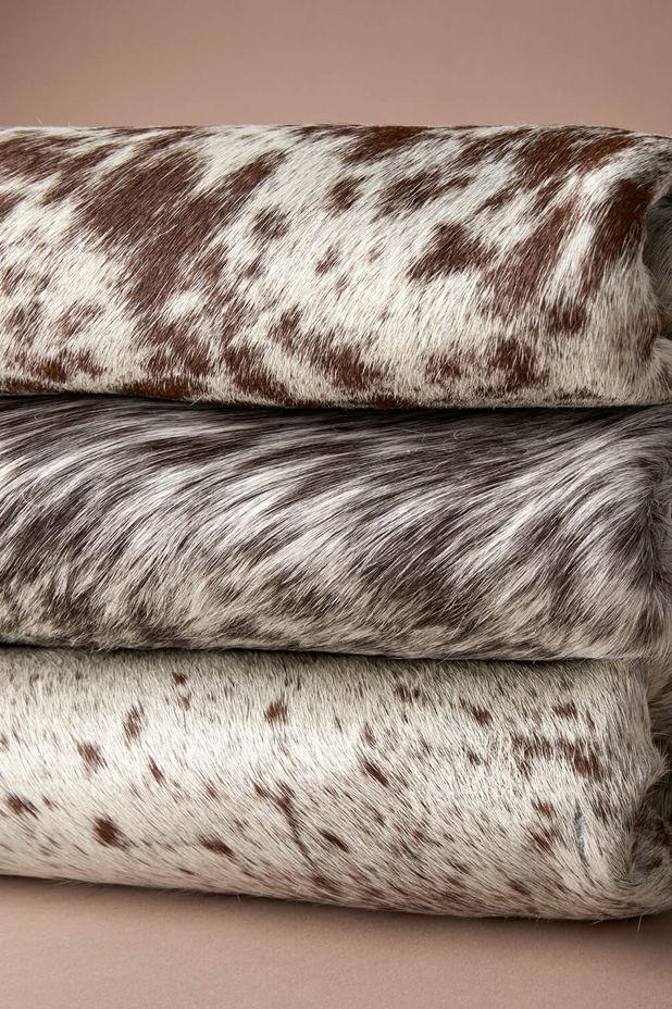 Tan reddish cowhide rug by Bagé Home