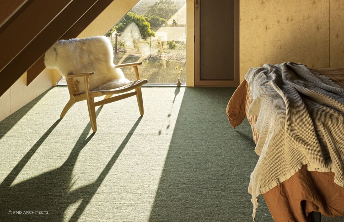 Sheepskin rugs are incredibly versatile as shown here in this Coopworth property on Bruny Island in Tasmania - Photography: Dianna Snape