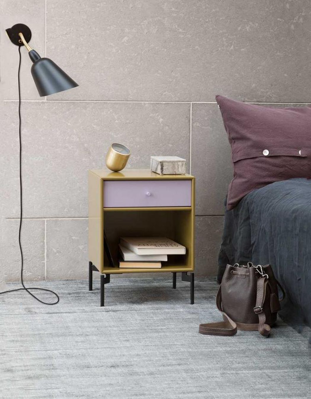 Some bedside tables, like this Dream Bedside Unit, have ample storage space.