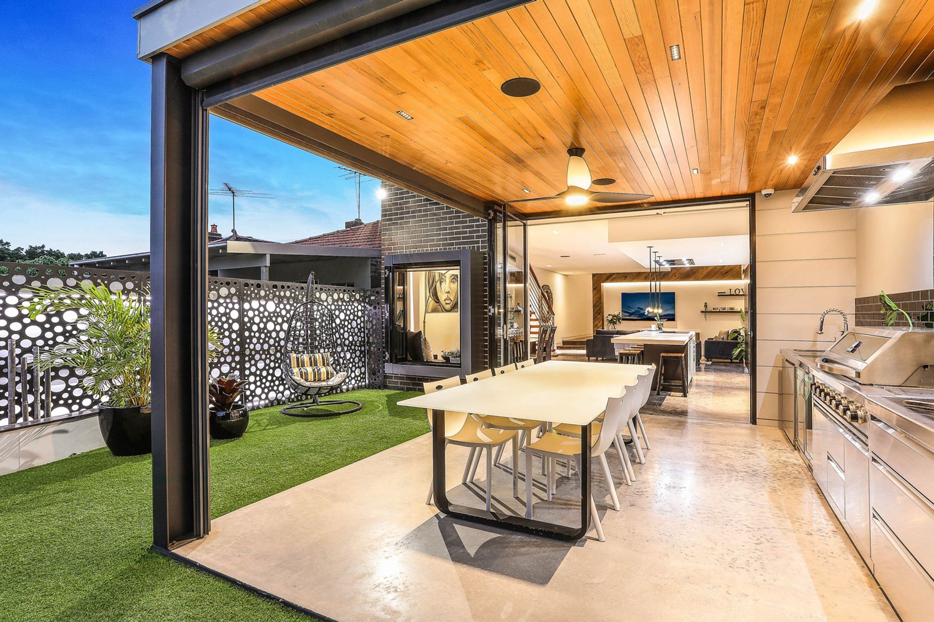 An attractive ceiling fan light at a modern family home in Sydney designed by Adrian Tarrant
