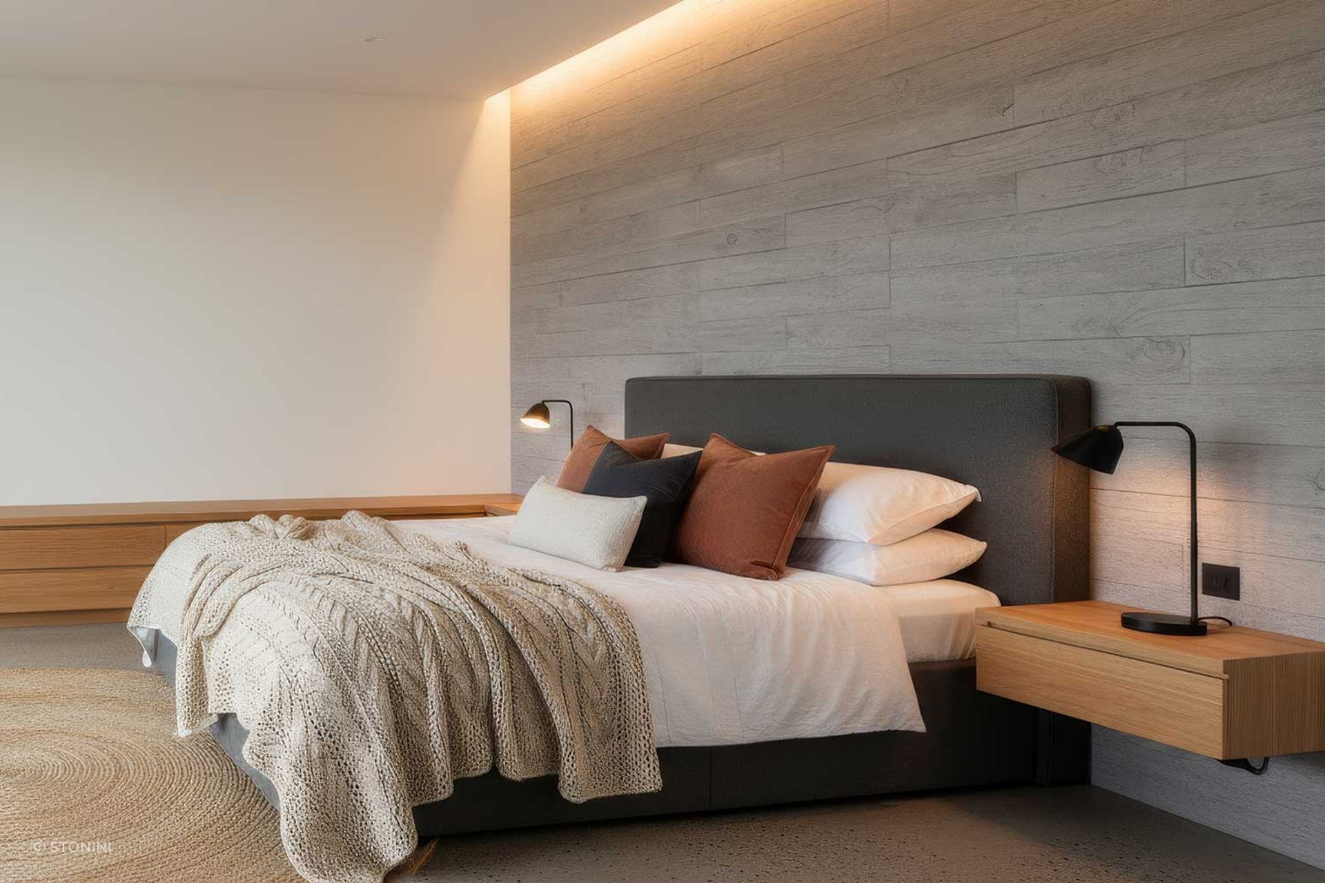 Board-formed concrete is used strategically to create a bold, yet balanced, feature wall behind the bedhead (Conceptual rendering).