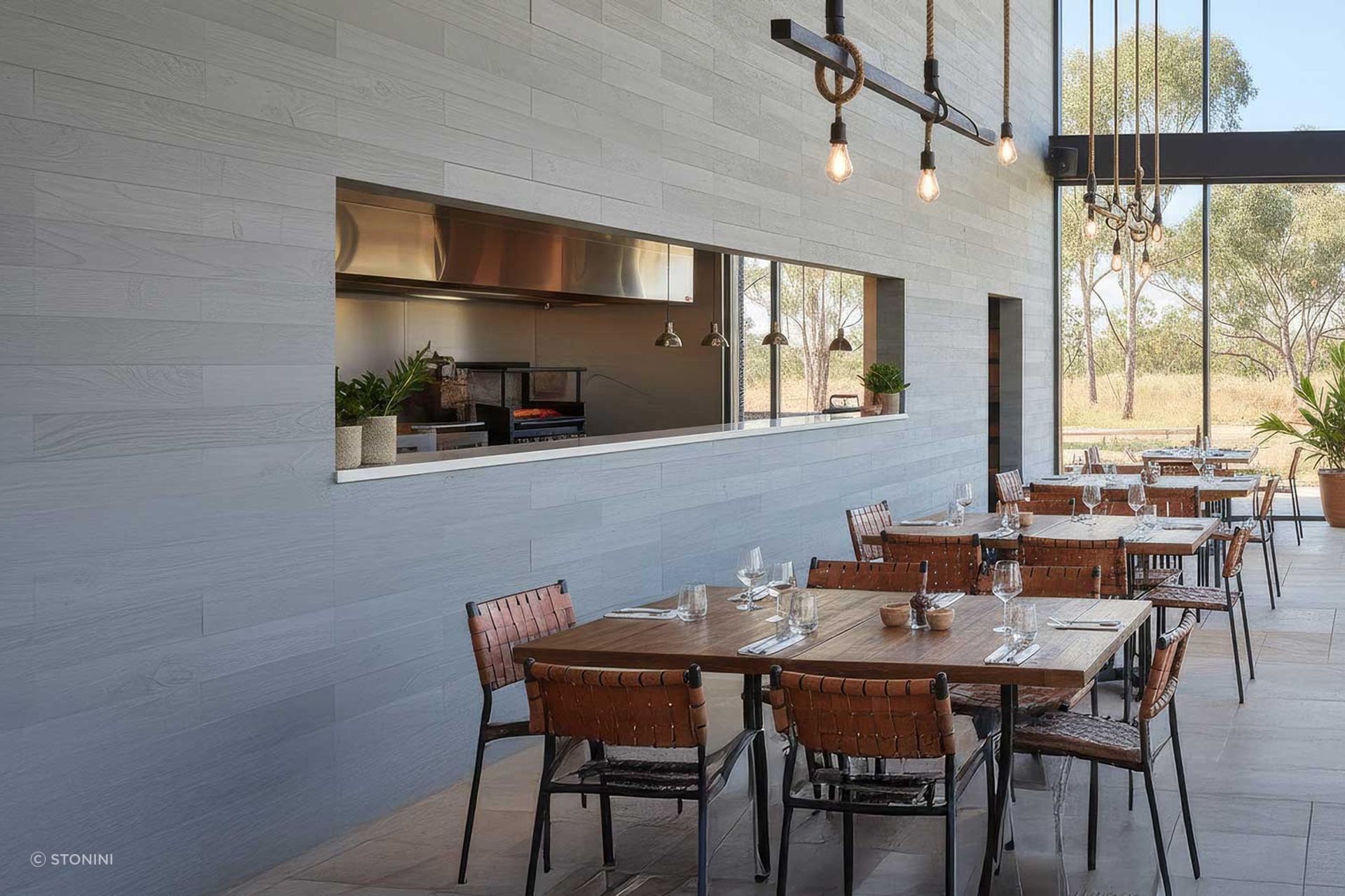 Concrete wall panels in a modern restaurant (Conceptual rendering).