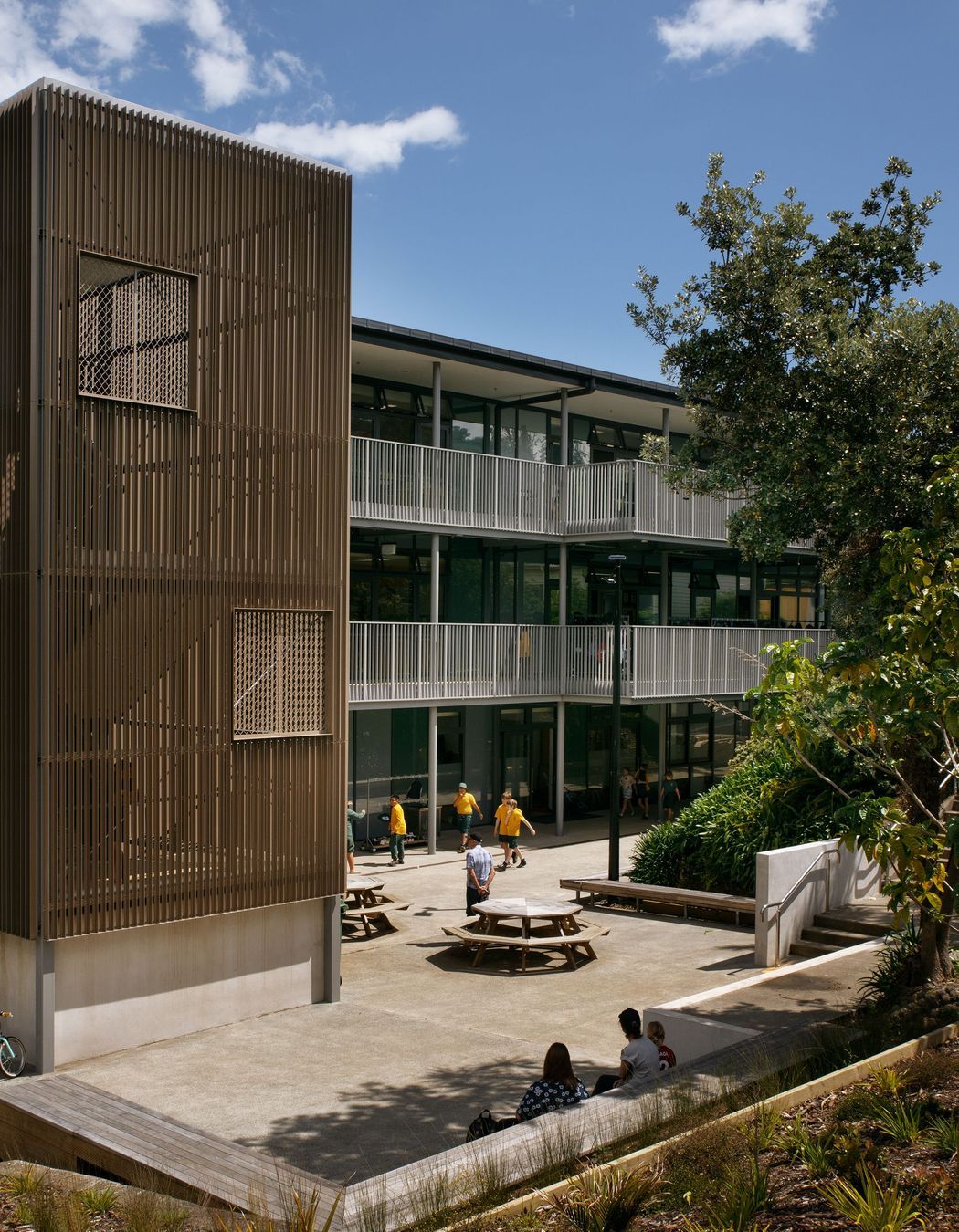 Custom UNEX stair enclosure and Hampton balustrades installed in a school setting