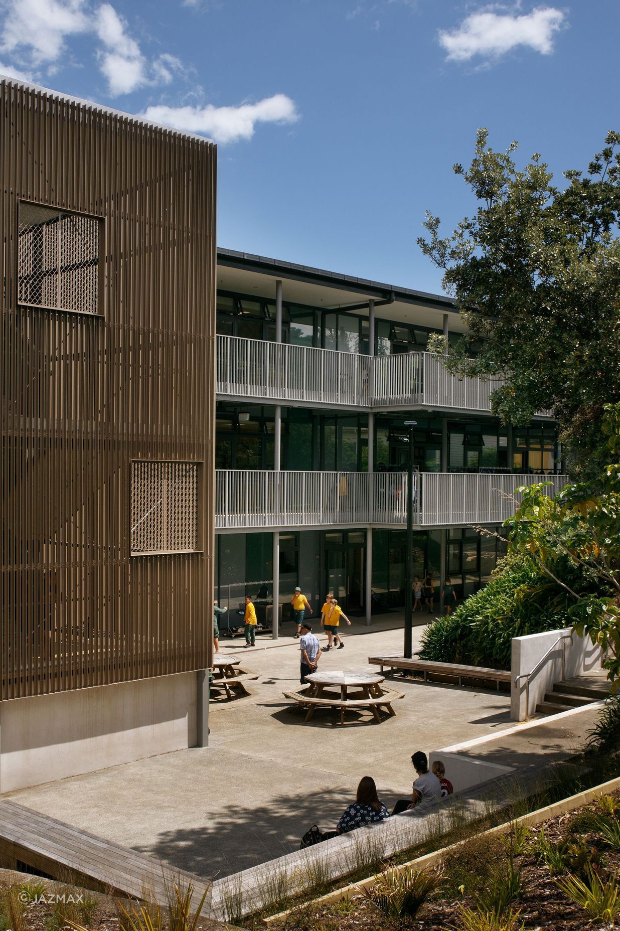 Custom UNEX stair enclosure and Hampton balustrades installed in a school setting