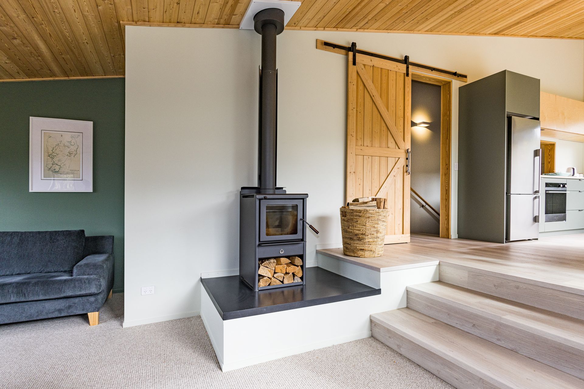 A wood burner adds ambience, and provides back-up heating.