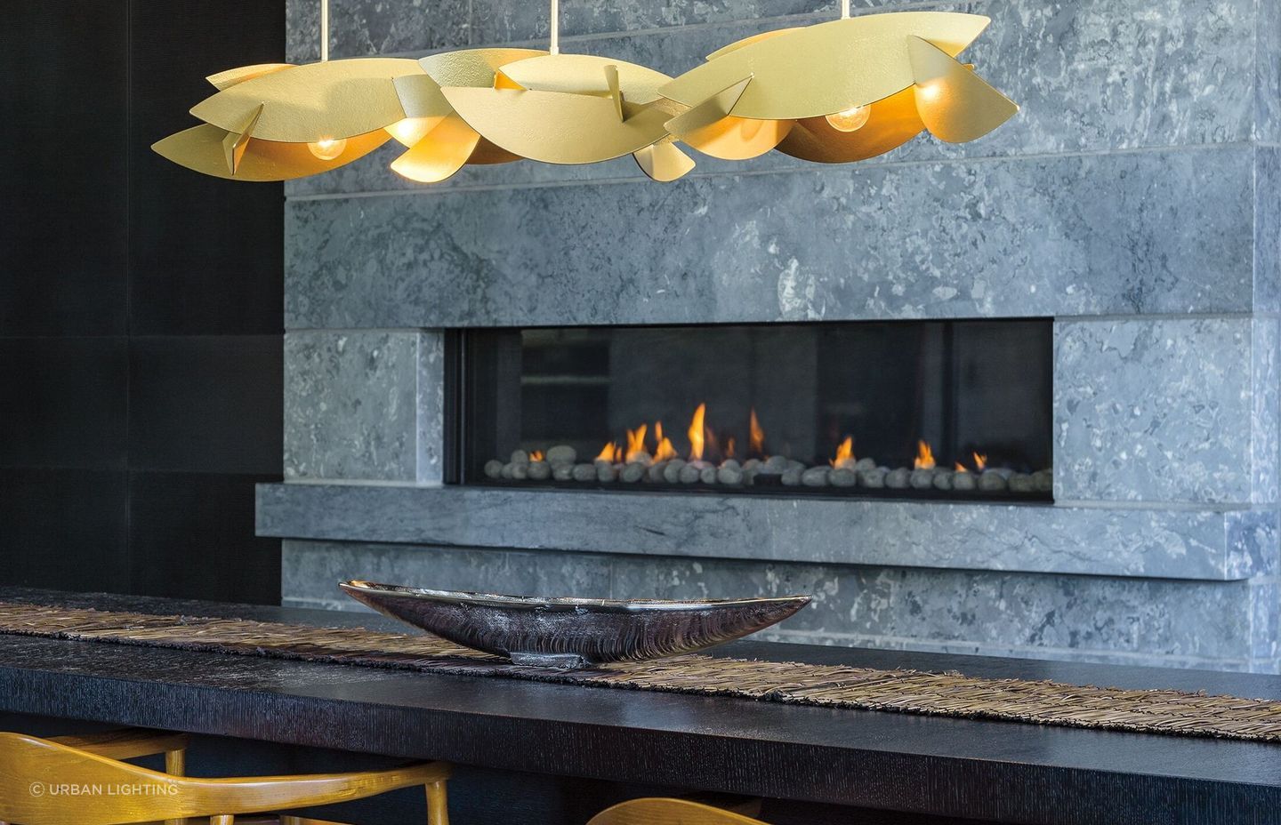 With the textured steel intersecting with the lights the Koi Collections creates a drama of light and shadow