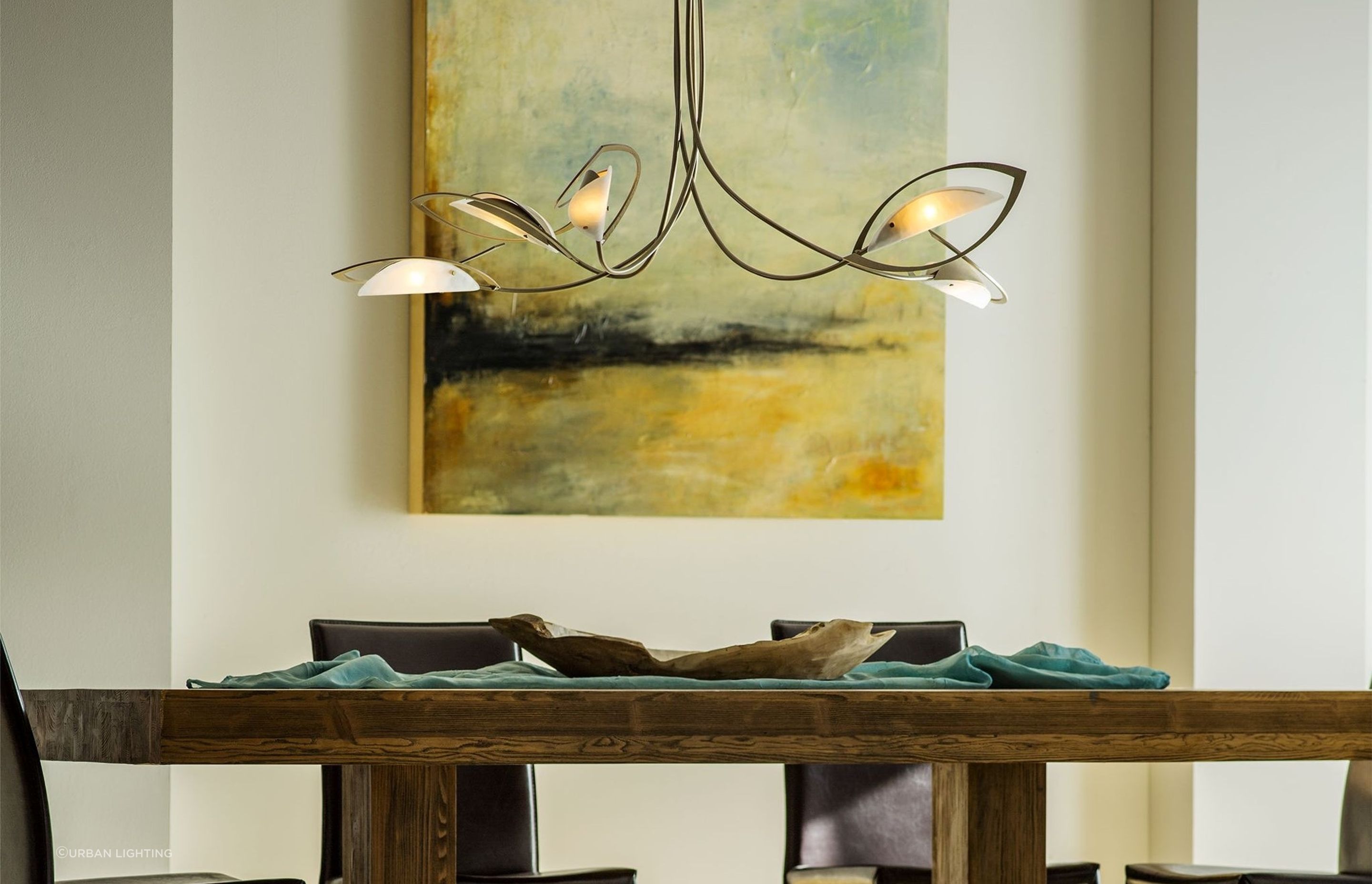 The Aerial Pendant is a sleek and luxurious example of lighting that strikes an artistic balance of materials and style