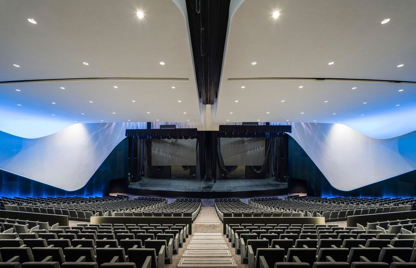 The 1400  seat tiered auditorium is divisible into two 700-seat venues.