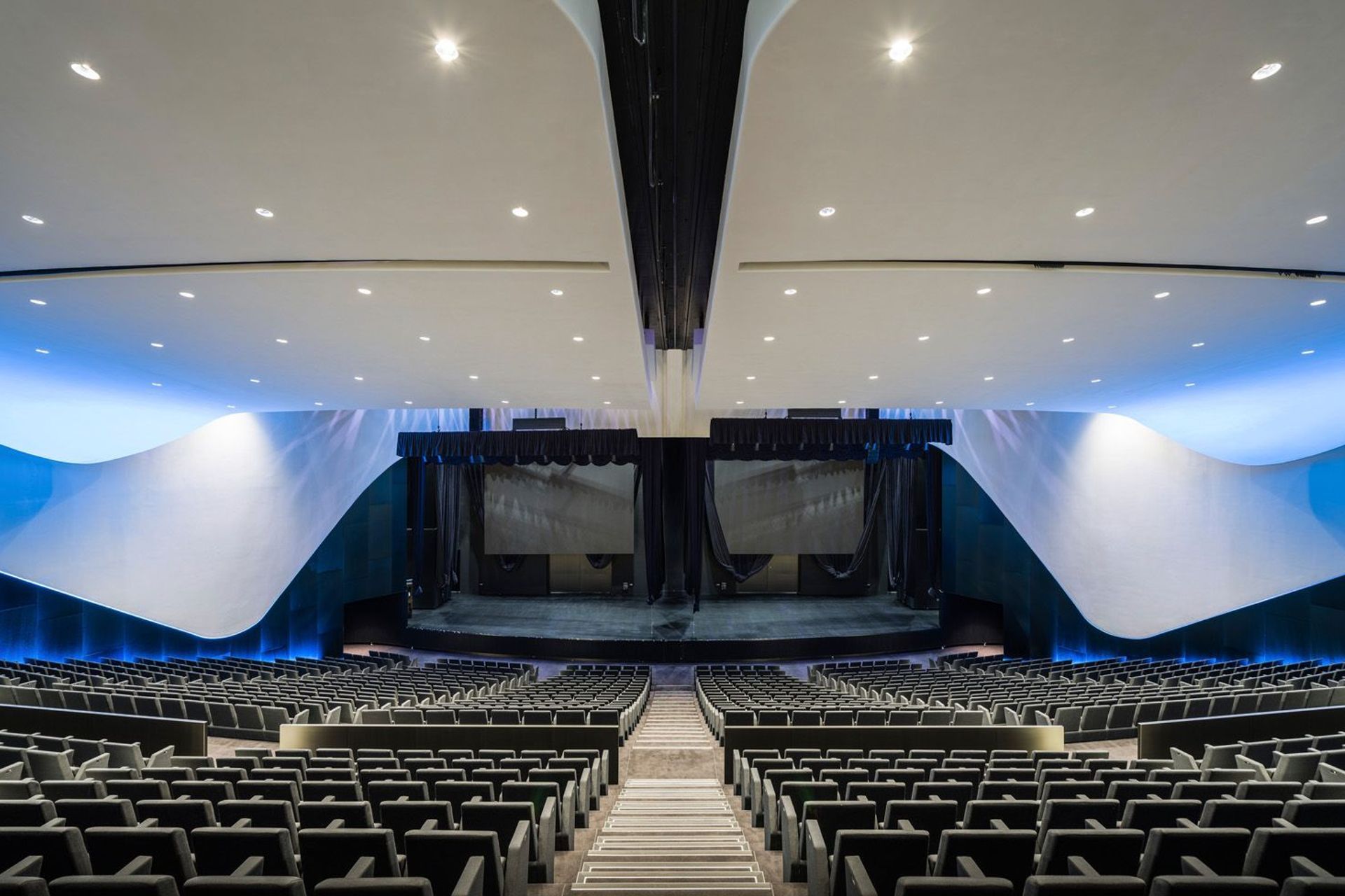 The 1400 seat tiered auditorium is divisible into two 700-seat venues.
