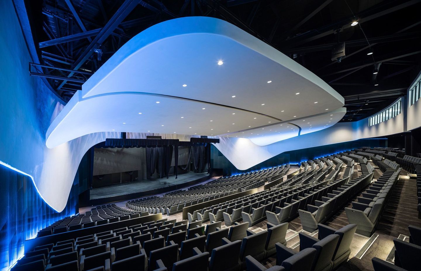 The acoustic panels were specifically designed to support the space when it is divided into two venues.