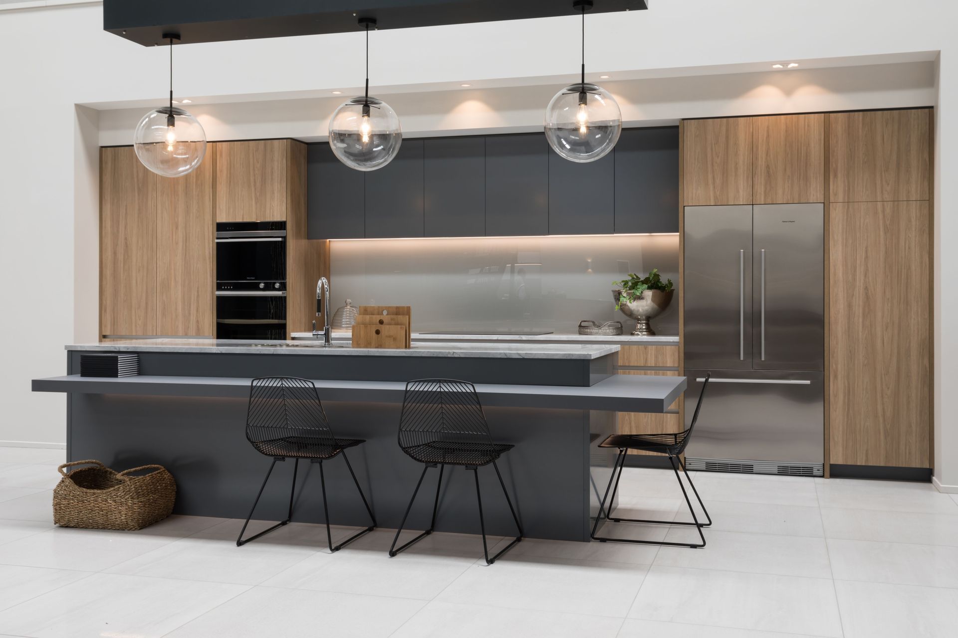 Matching splashbacks and benchtops is crucial to the overall aesthetic cohesion of the kitchen.