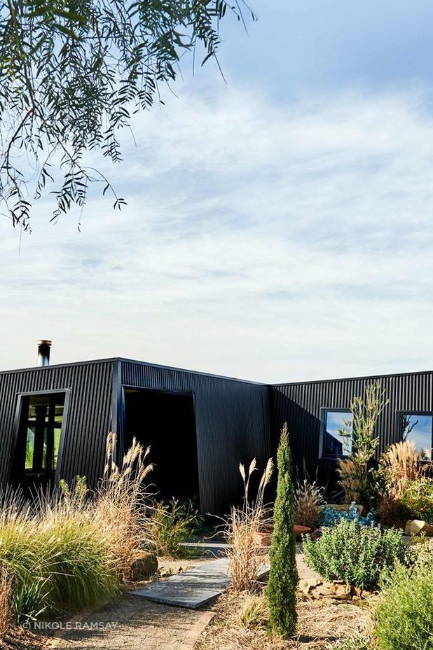 Eco-Friendly Hillside Retreat x Sculpt Fireplace Collection