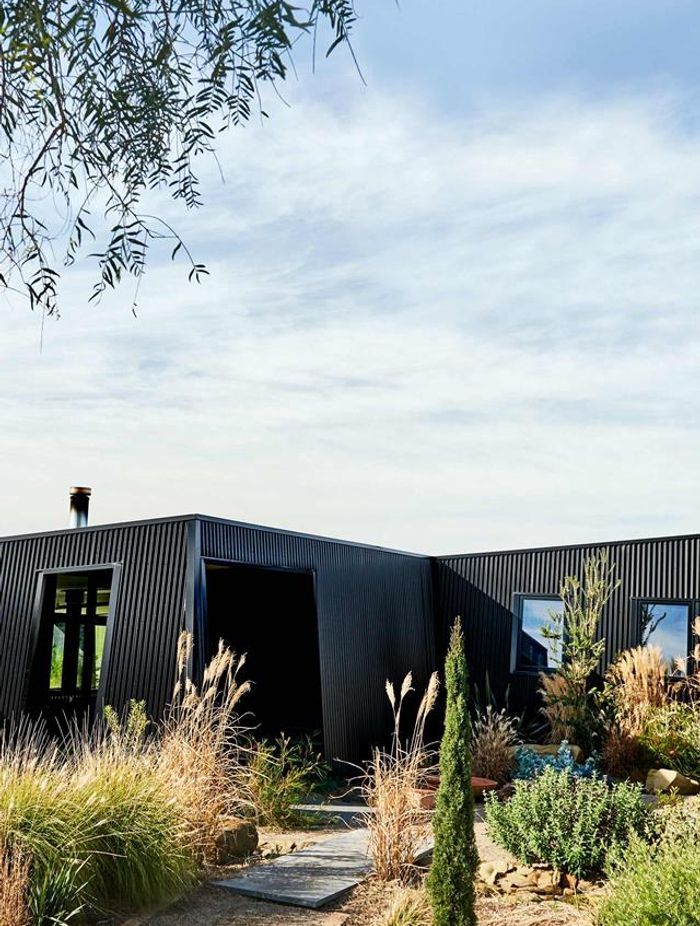 Eco-Friendly Hillside Retreat x Sculpt Fireplace Collection