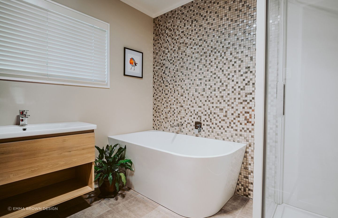 A nice mosaic accent wall makes the perfect option for a bathtub surround in Fitzherbert Avenue.