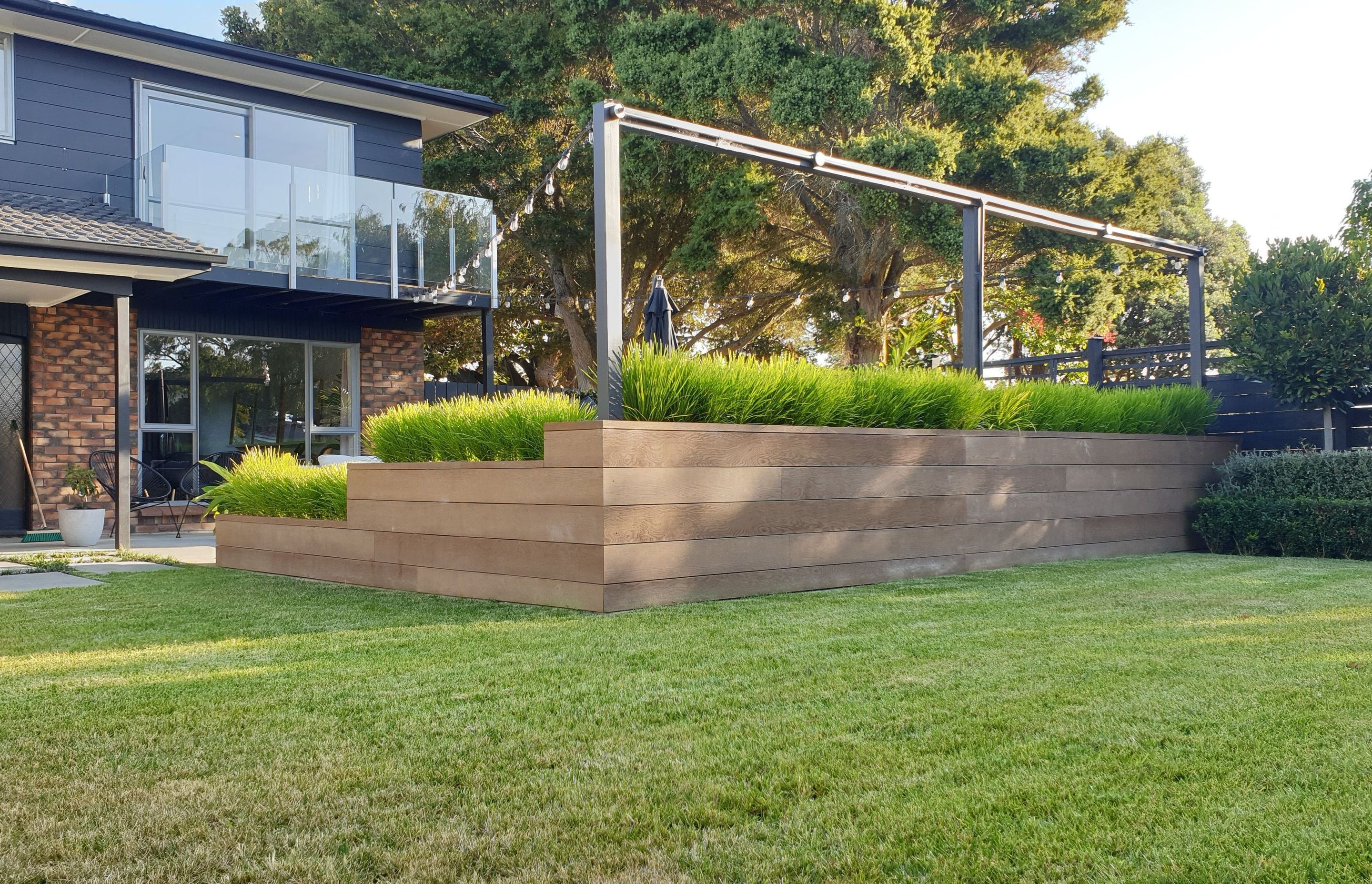 Planter box featuring Millboard's Coppered Oak decking boards