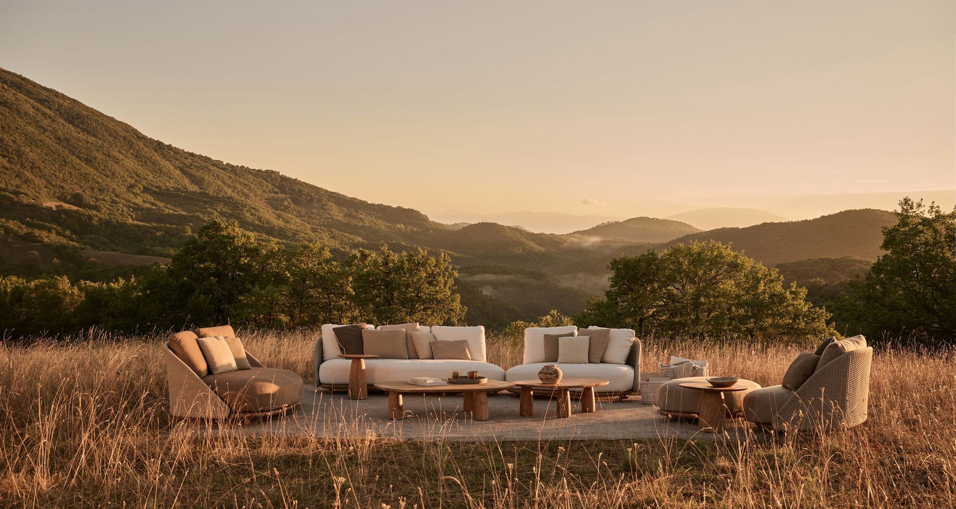 Elio seating by Yabu Pushelberg with Dunes low tables and Gobi basket.