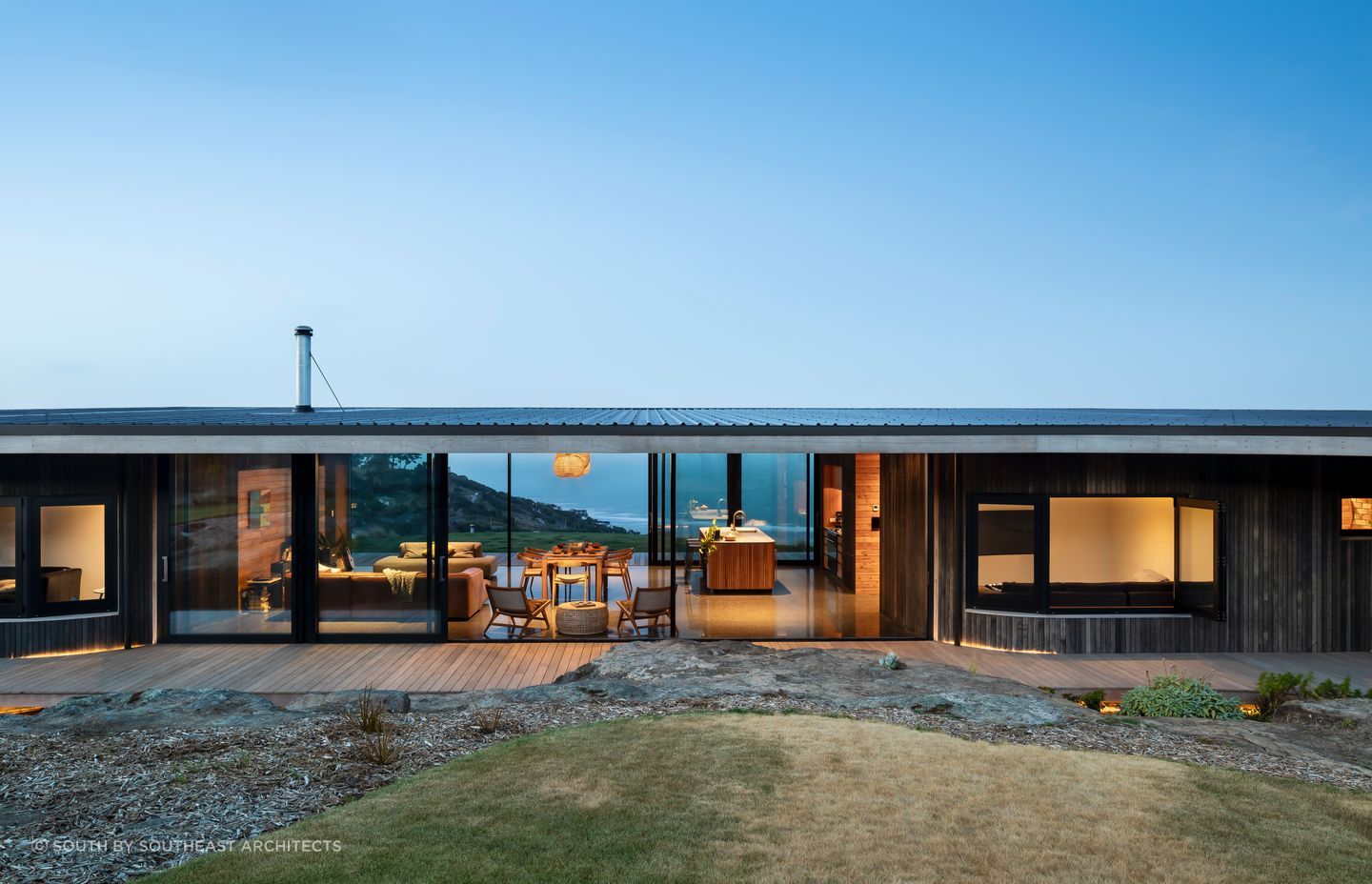 This Port Hills home was amazingly built over the existing volcanic rock formations - Photography: Sarah Rowlands