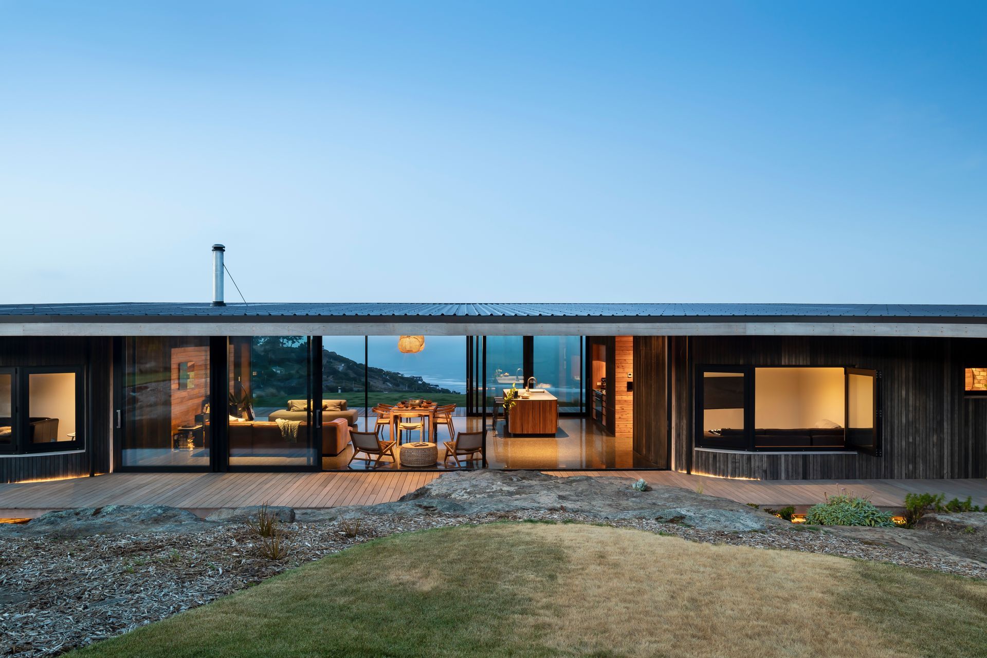 This Port Hills home was amazingly built over the existing volcanic rock formations - Photography: Sarah Rowlands