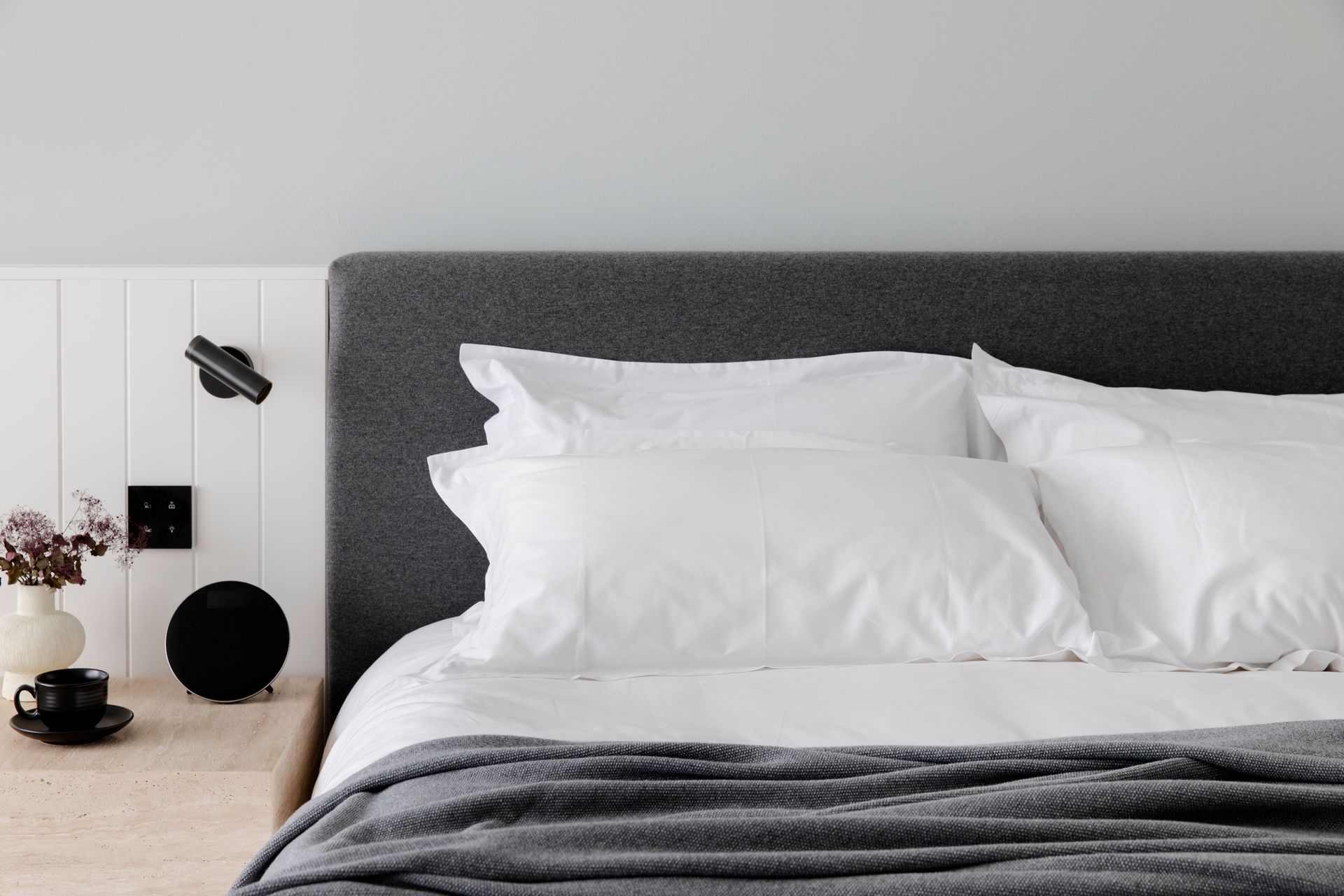 This immaculate setup at the Manly Pacific Hotel shows how contrasting textures in bedding can create a sophistcated look
