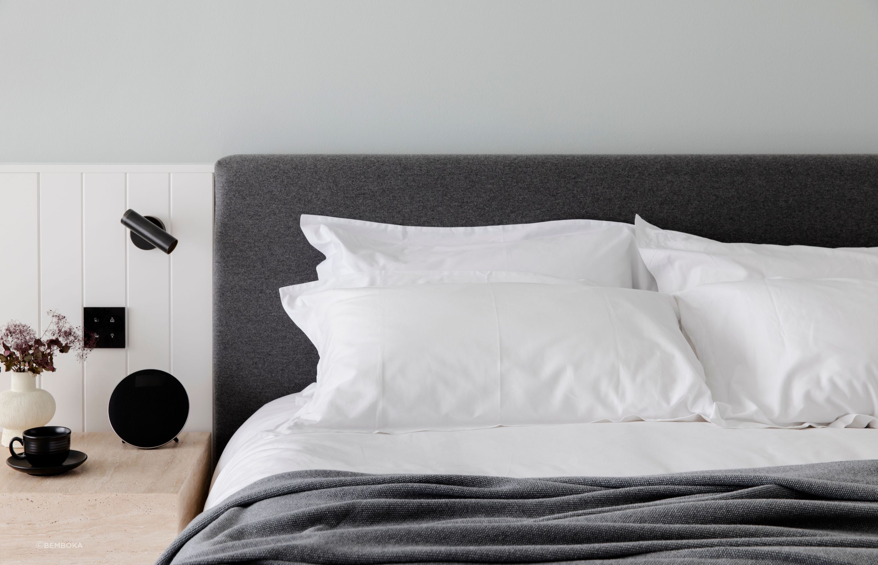 This immaculate setup at the Manly Pacific Hotel shows how contrasting textures in bedding can create a sophistcated look