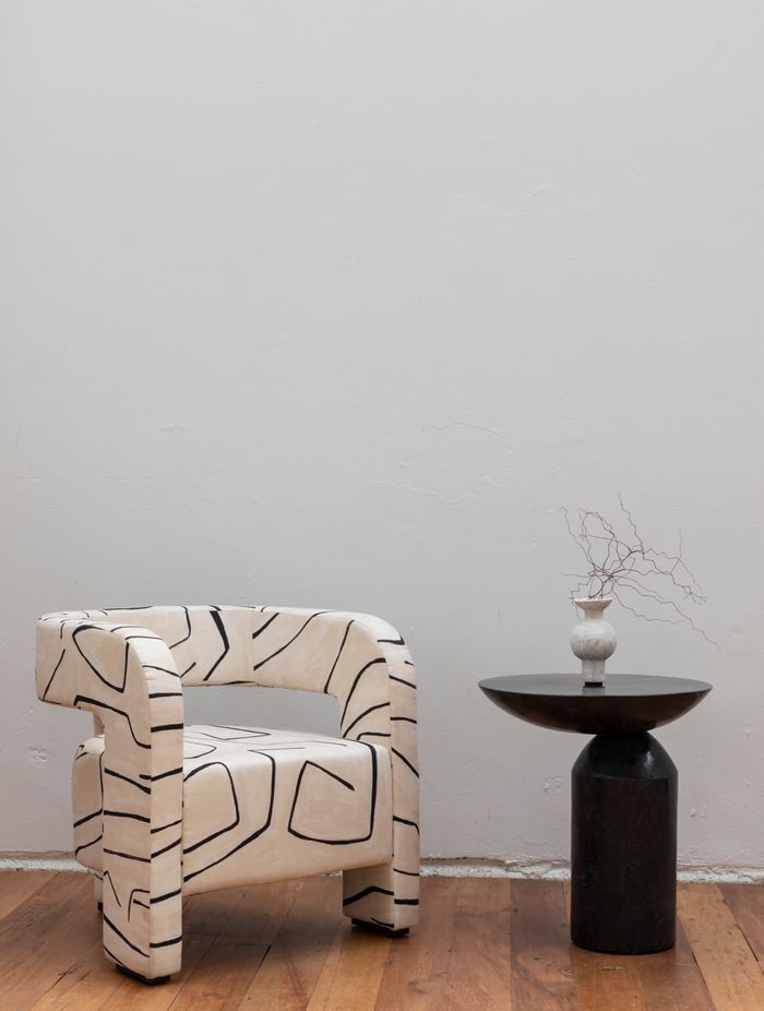 David Shaw's Walter side table is the perfect interpretation of the asymmetrical trend.