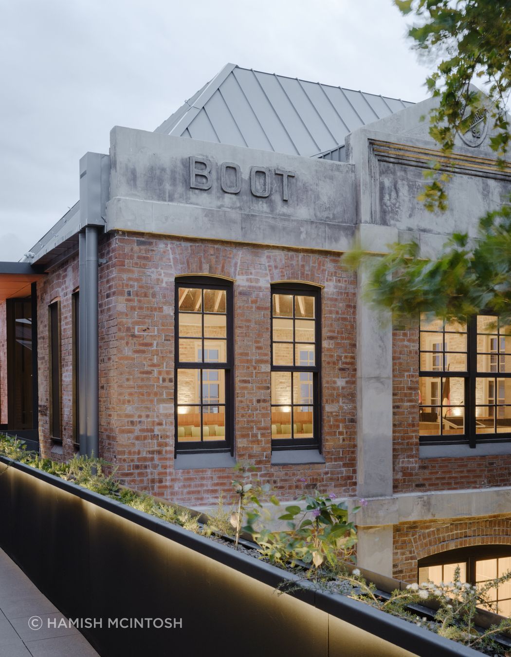 External brick façade retained in Boot Factory restoration while ASH's mass timber was used throughout the internal structural restoration. Image: Hamish McIntosh
