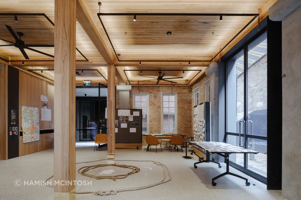 Glue-laminated MASSLAM hardwood beams and columns, define the reconstructed post-and-beam structure of the Boot Factory. Image: Hamish McIntosh