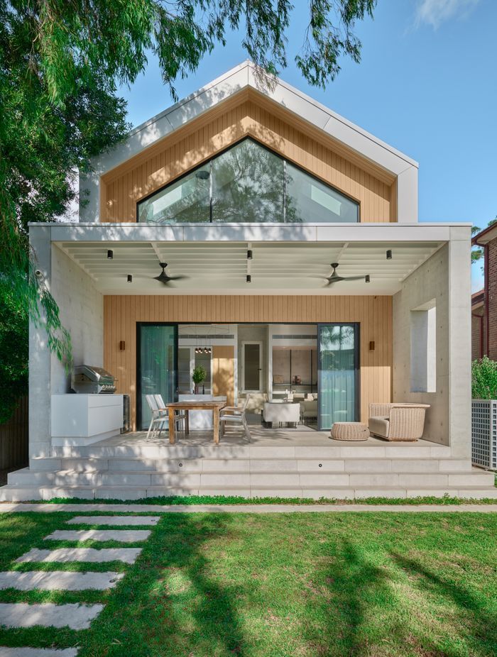 Gable House in Kensington by SSD Studios. Blending Chinese and Irish heritage with European barn-style architecture, Luna Chiaro Limestone flows seamlessly from interior to outdoor entertaining areas. A 2025 project where cultural layers and natural materials unite.