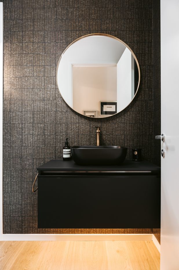 A considered approach to form and function, the bathroom lights turn on automatically.