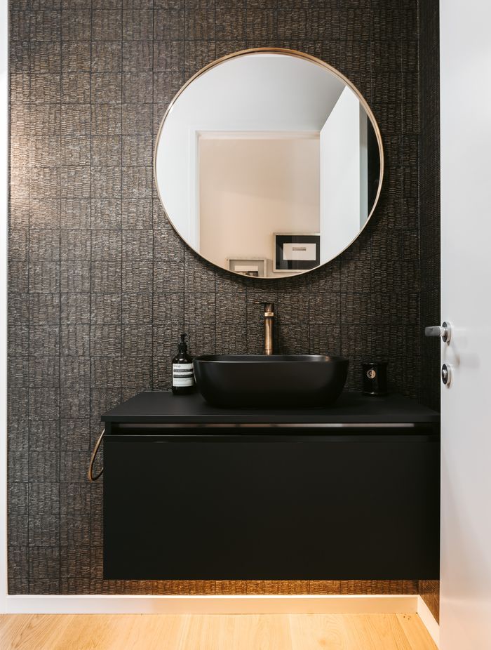 A considered approach to form and function, the bathroom lights turn on automatically.