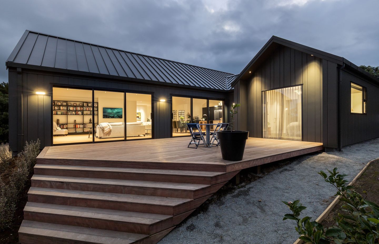 Resene Cool Colour paint reflects heat and protects the cladding.