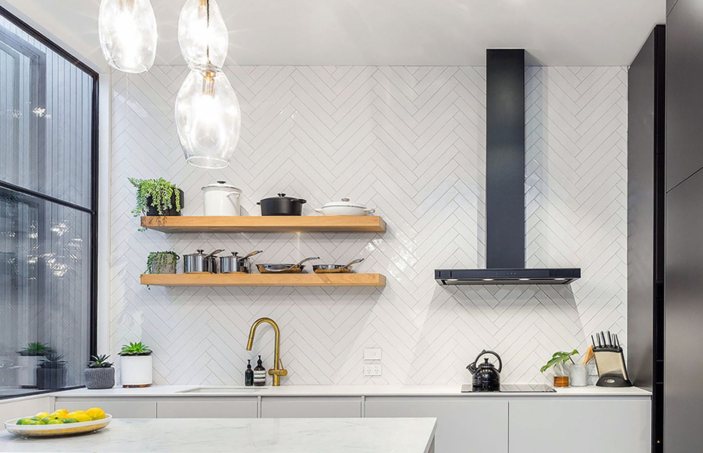 © First Avenue Homes - featuring Schweigen DS3326B-9S 900mm Silent Wallmount Rangehood