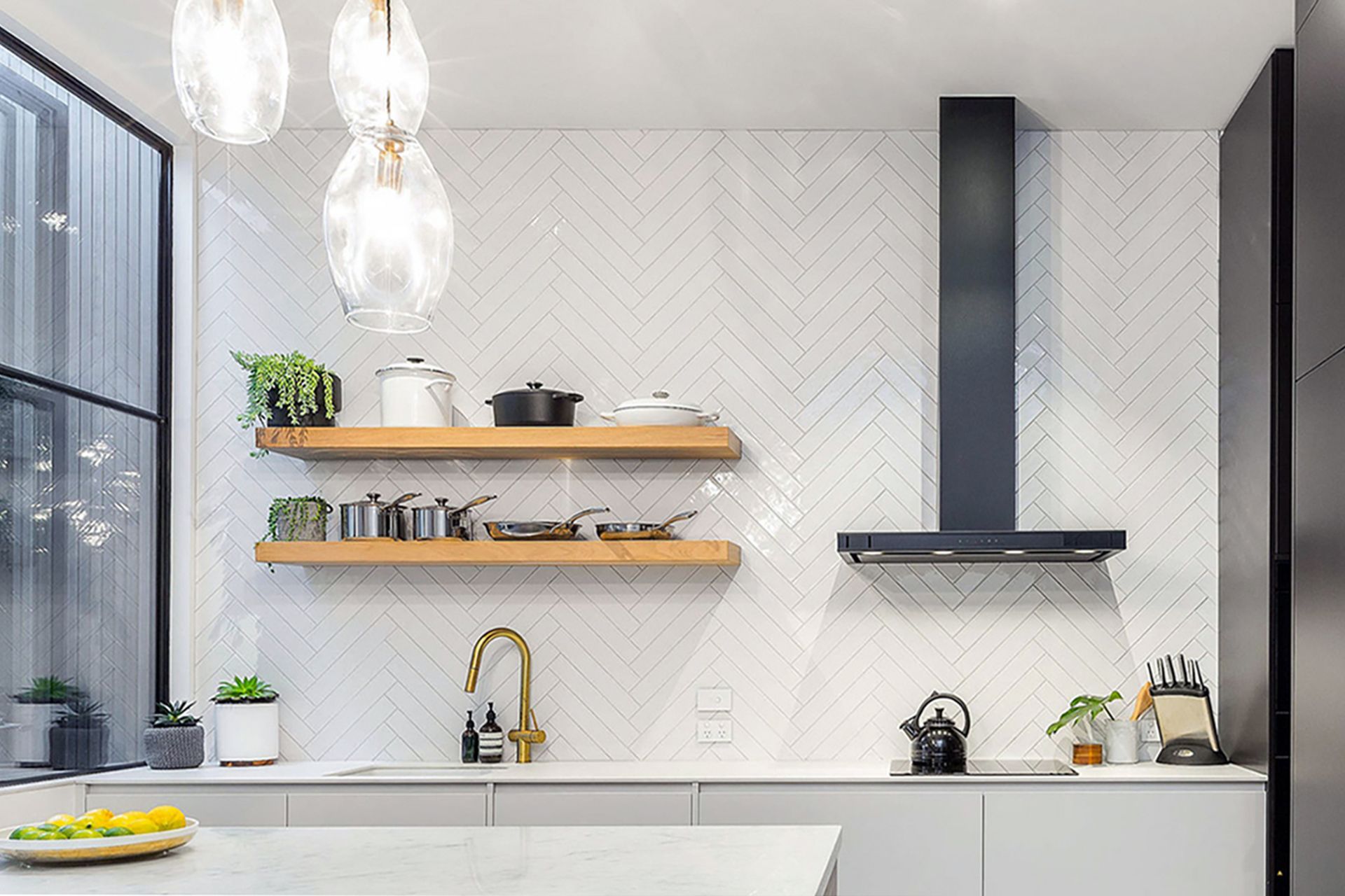 © First Avenue Homes - featuring Schweigen DS3326B-9S 900mm Silent Wallmount Rangehood