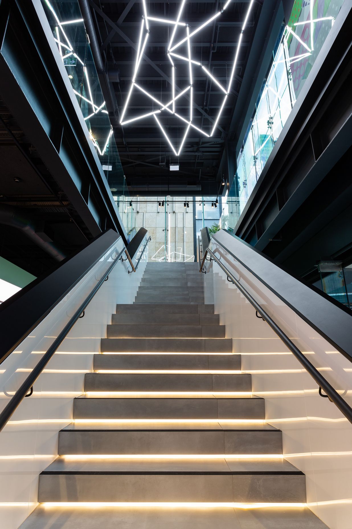 For this commercial project, Lightplan specified Ligeo, a modular 3D system of individual luminaires that link together to create dynamic forms.