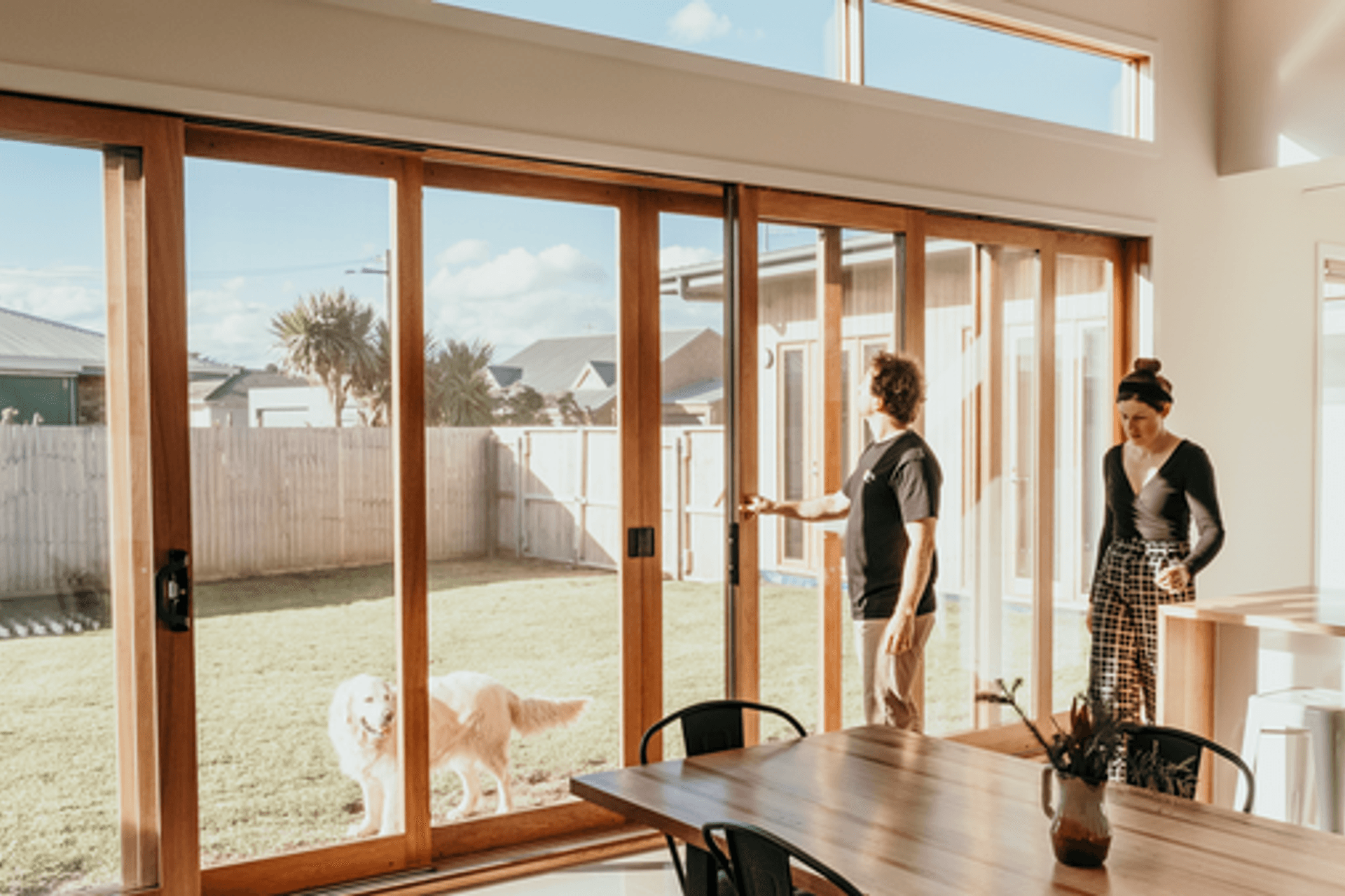 Image: The L Shape House features large north facing double glazed windows which captures plenty of natural light.