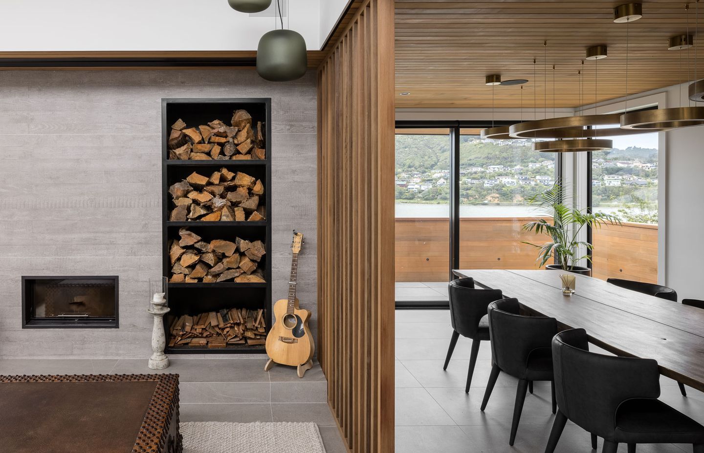 The lounge is now more connected to the dining room, sharing a partition that allows visibility between each room.