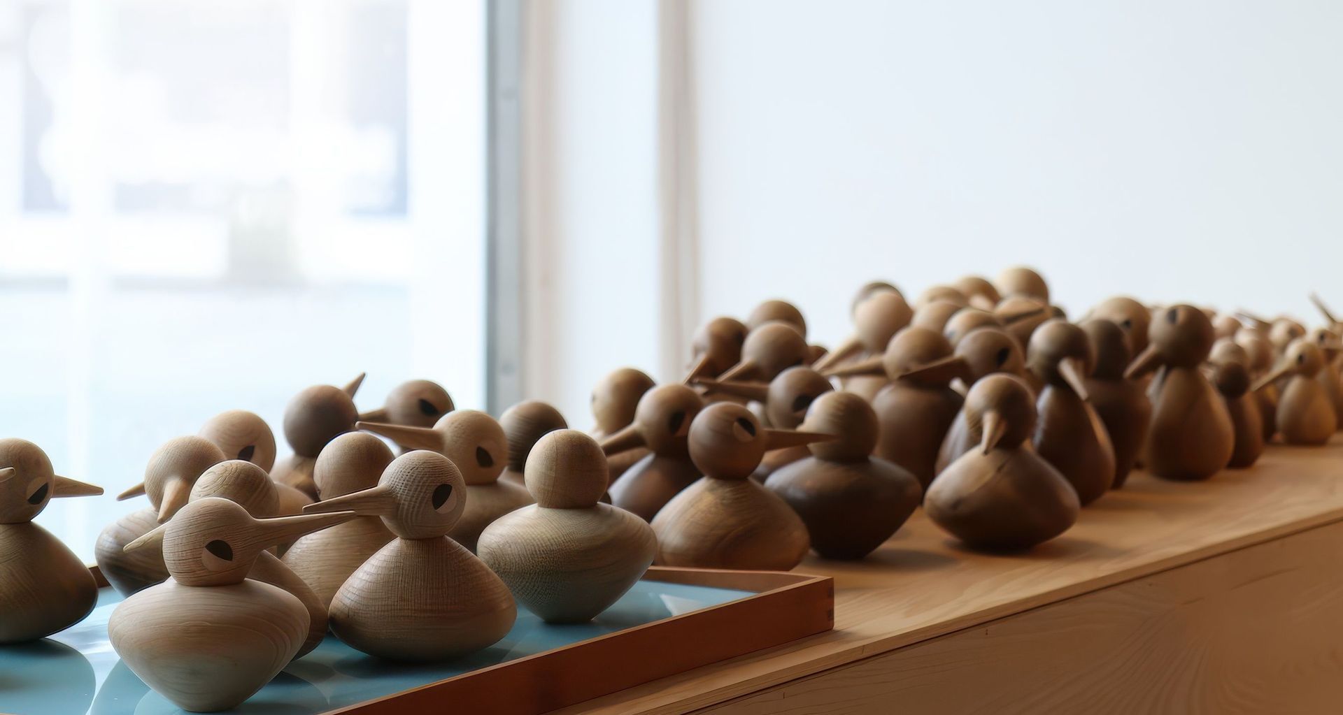 Over 100 wooden birds from Kristian Vedel, thanks to Danish brand Architectmade.