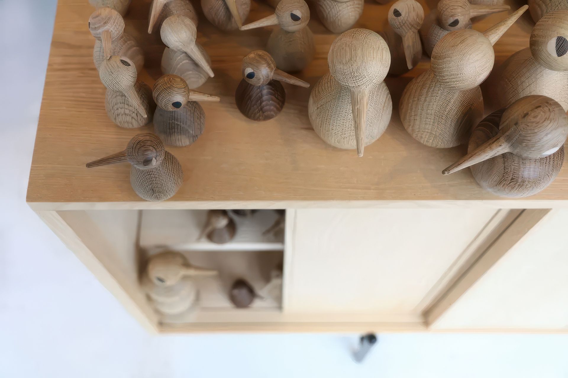 A playful display of Kristian Vedel's famous bird design, engaging with the repeated shapes to create height and depth with the installation.