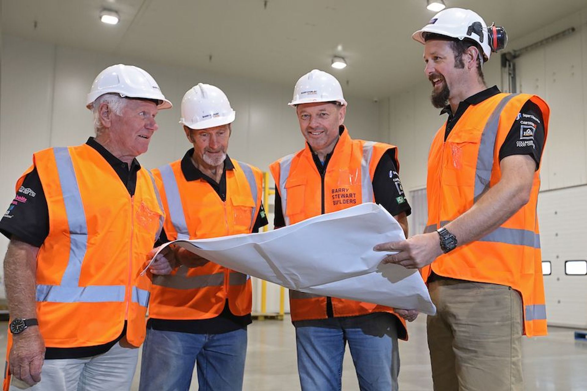 Barry Stewart (second from right) and the team inspecting the completed Bidfood Distribution Centre in 2017

