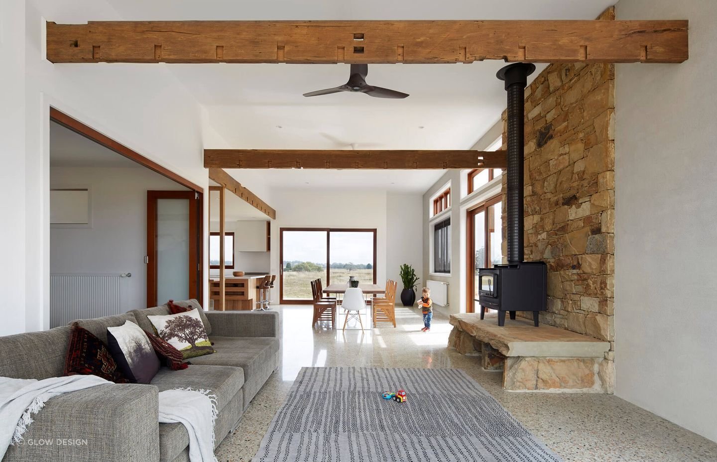 Exposed beams are on display in the living area.