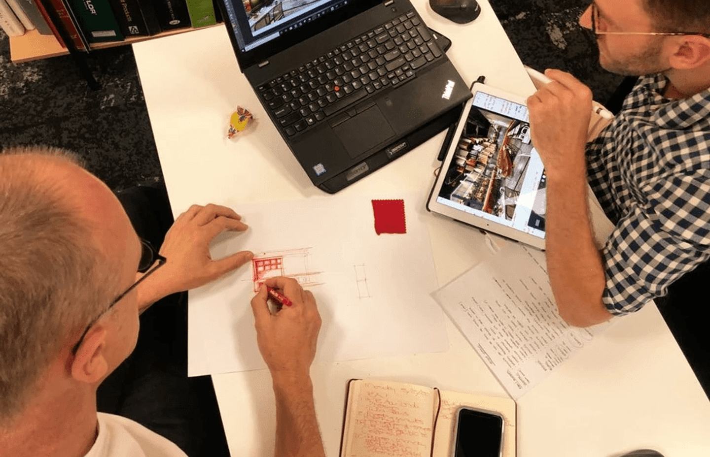 Image: Callie &amp; Calvin in design meeting by Roberto Zambri.