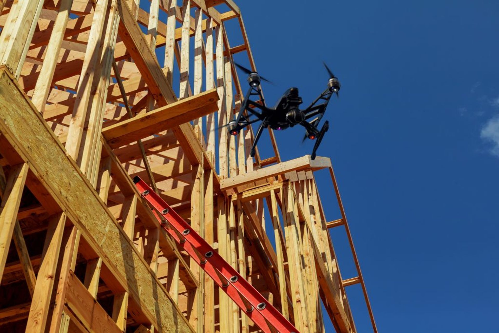 A drone flying over a building site. Image Shutterstock